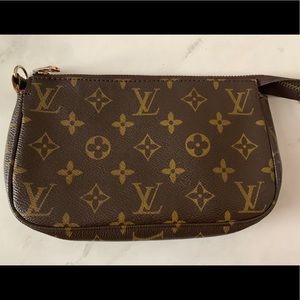 LV clutch **price reflects authenticity**